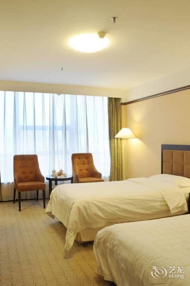 Yantai Asia Hotel Esterno foto